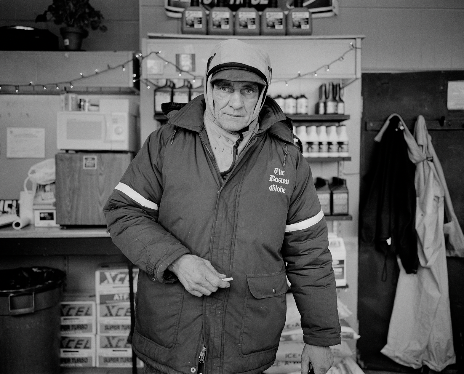 A photograph of man in a winter coat by Dylan Vitone