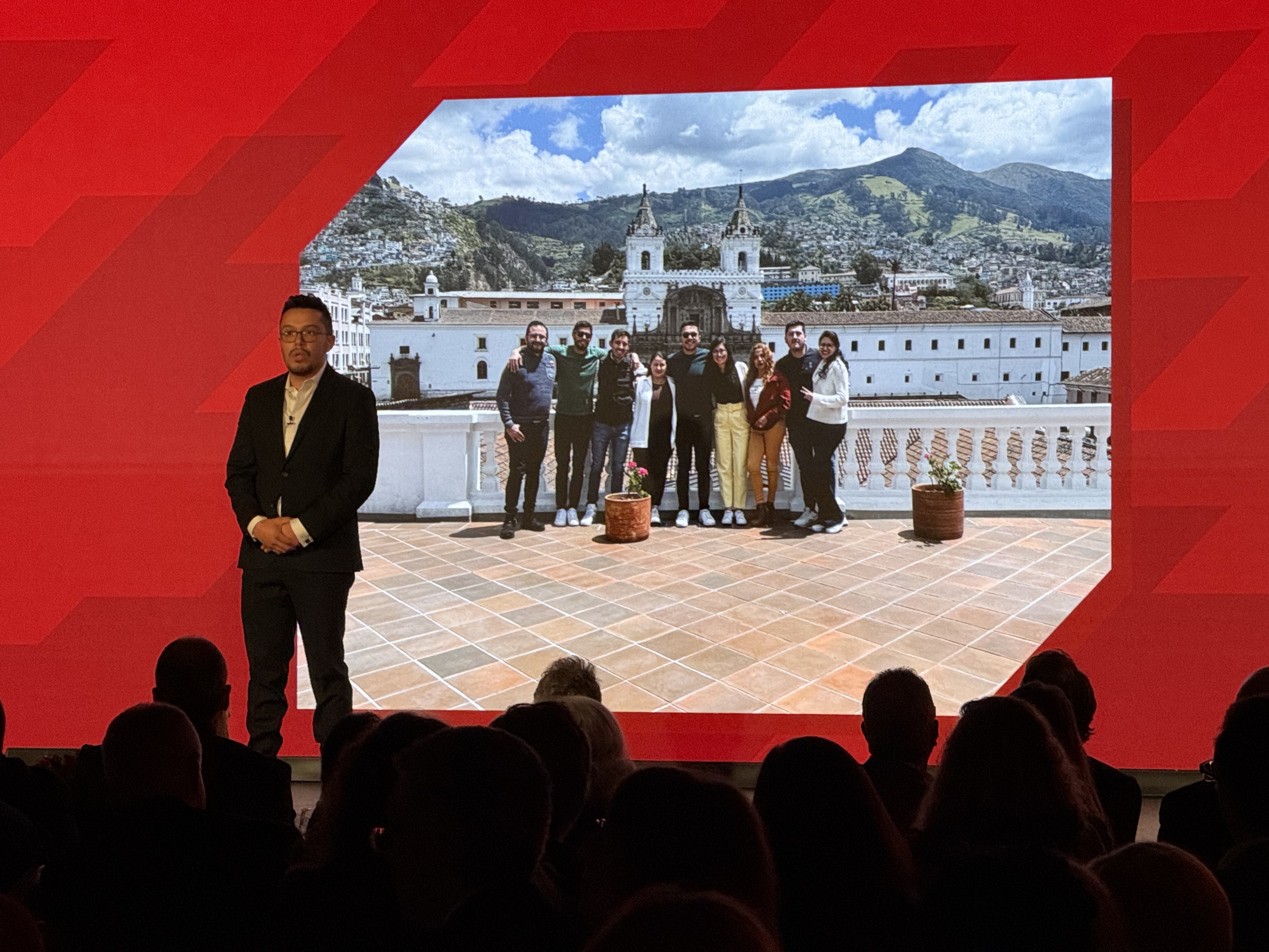 Luis Garcia presenting on a stage