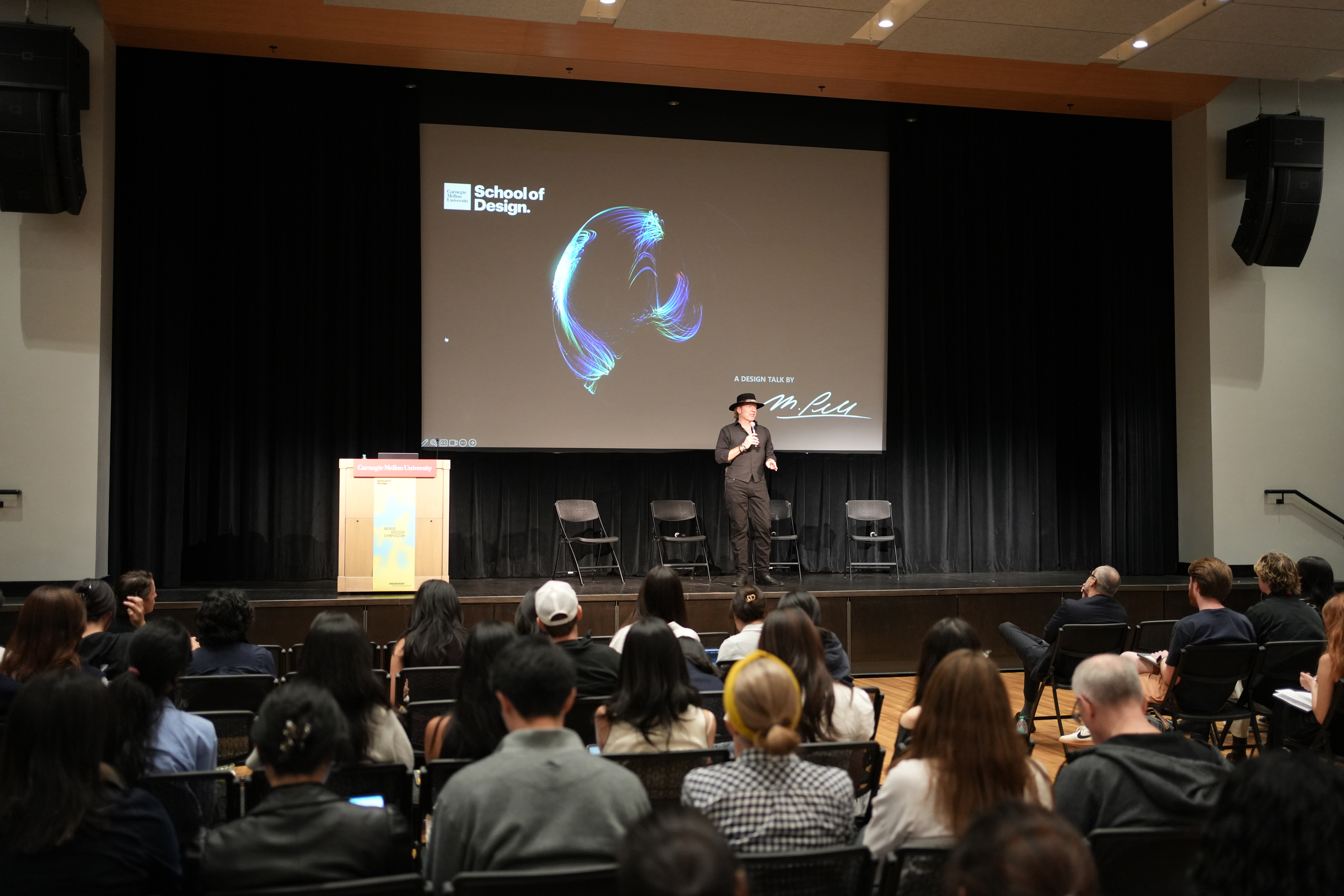 Mike Pell speaking at the Nexus Design Symposium
