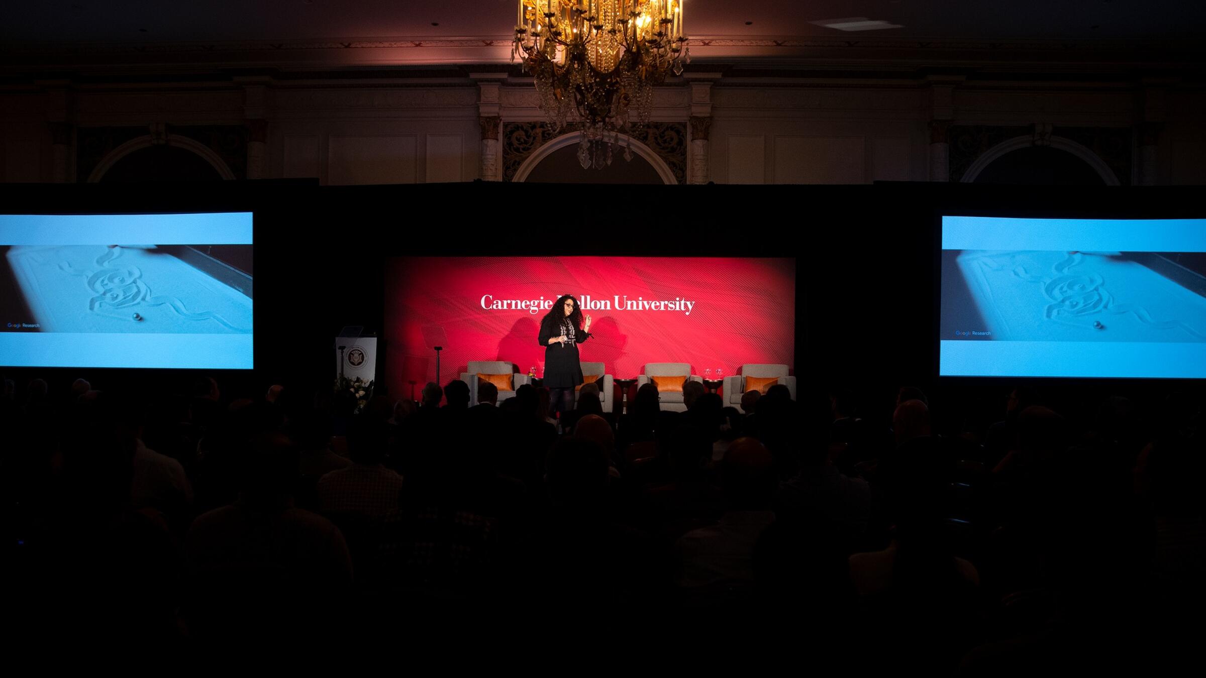 Dina El-Zanfaly presenting at an AI Conference