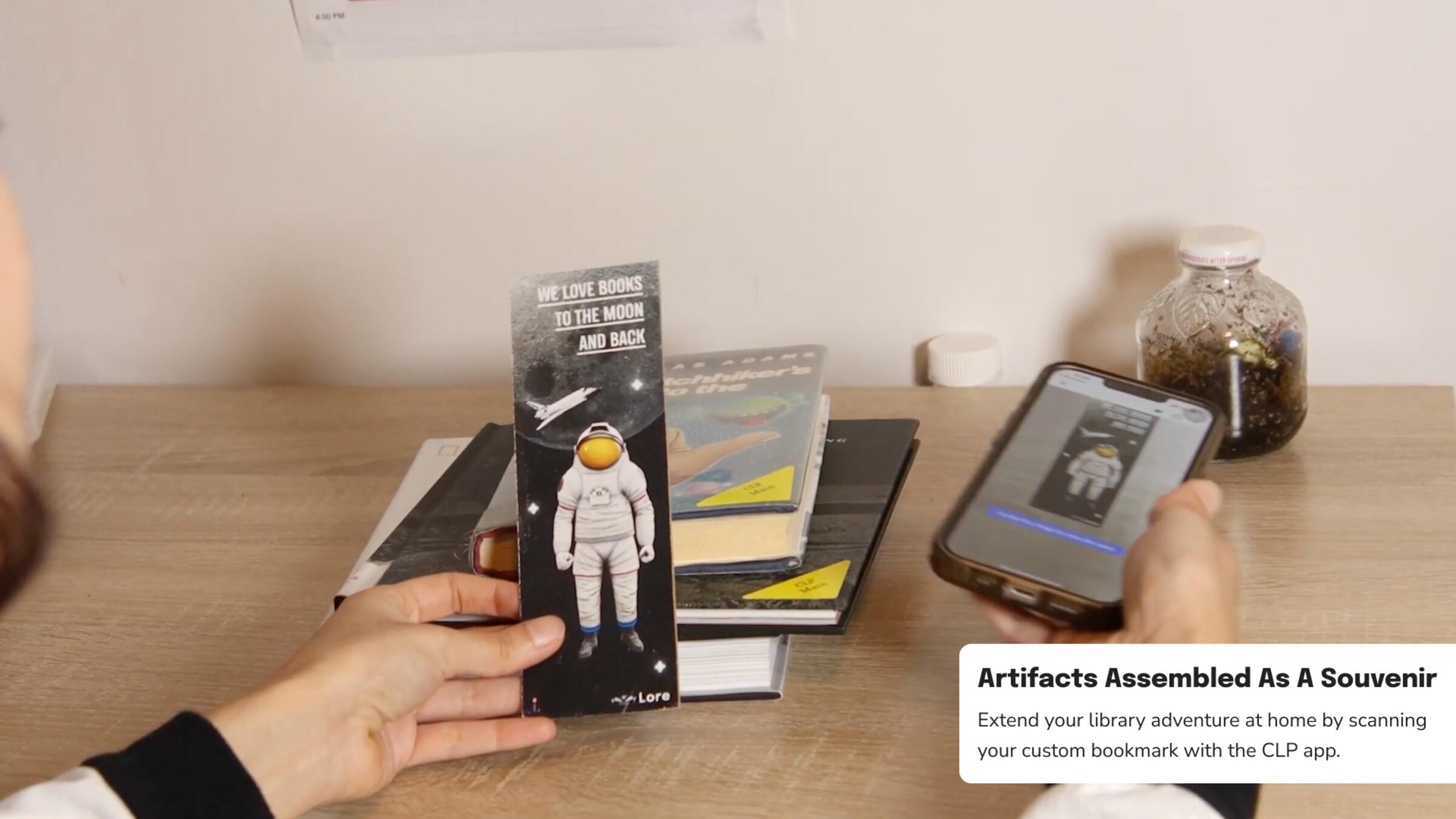A person holding a bookmark