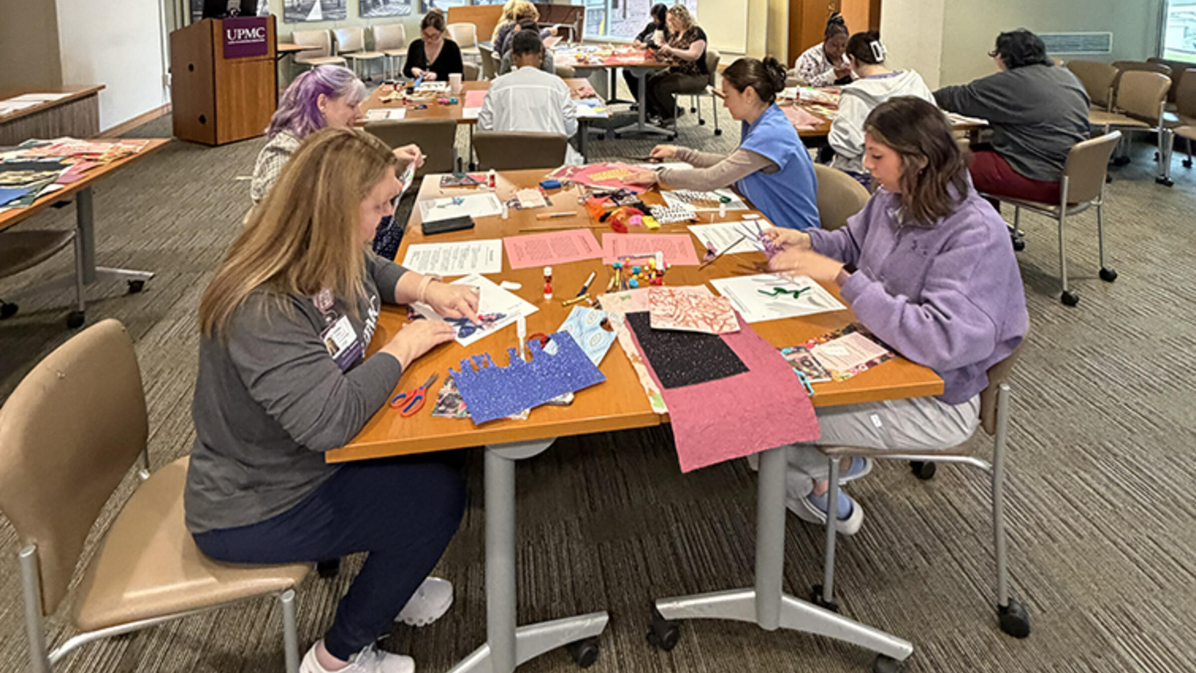 healthcare workers designing and creating collages