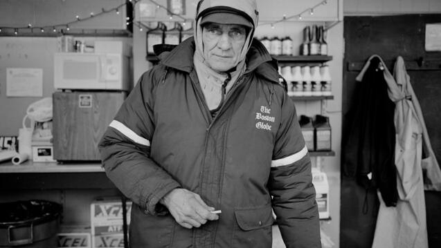 A photograph of man in a winter coat by Dylan Vitone