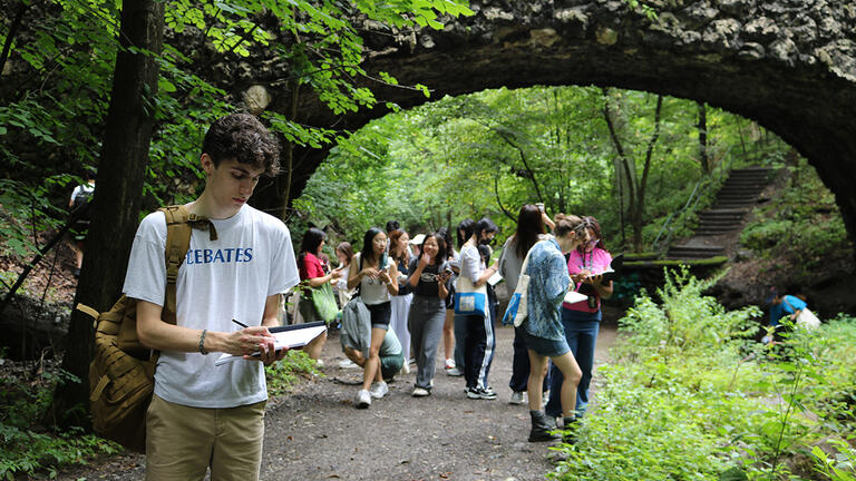 A class sketching outside in Schenley Park