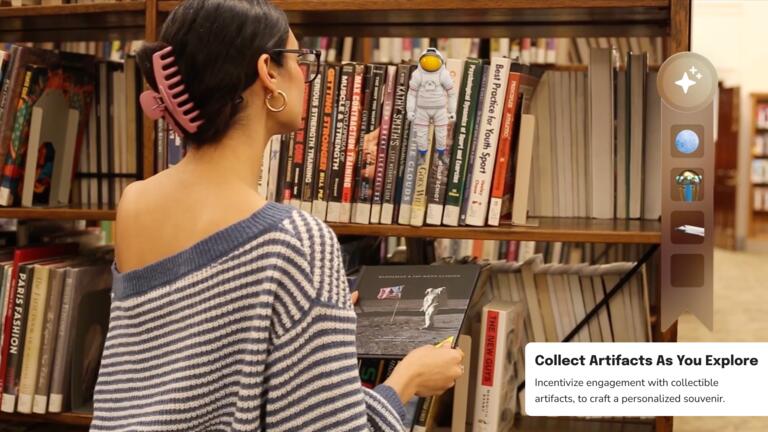 A woman looking at an astronaut in a library