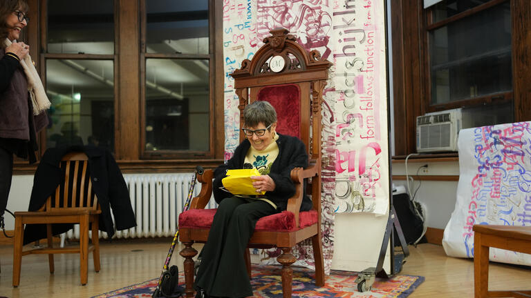 Myrna Rosen on a throne