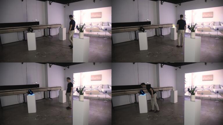 4 images of a person interacting with objects activated with responsive sound and projection